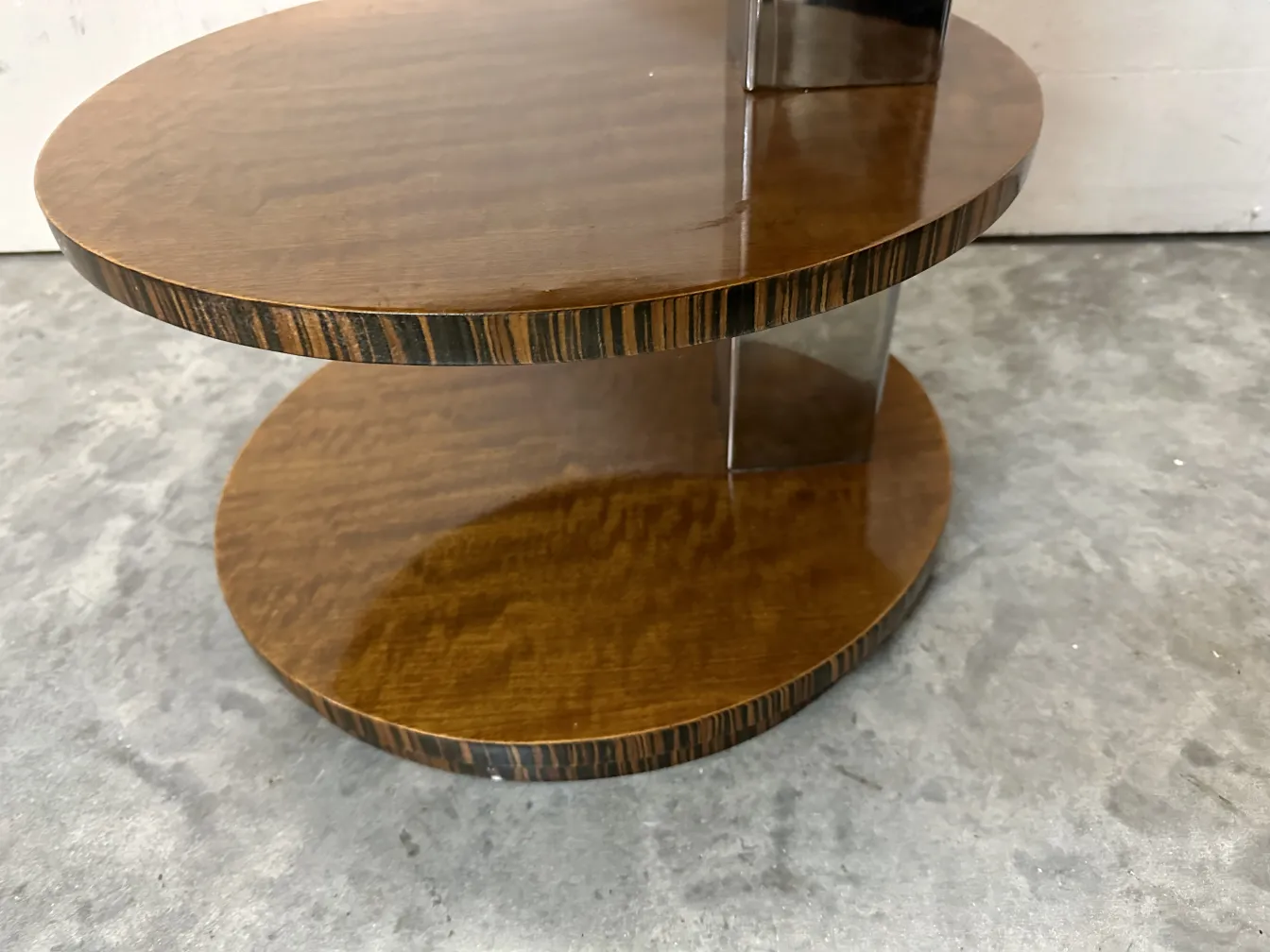 Antique small table with two levels, light and dark brown