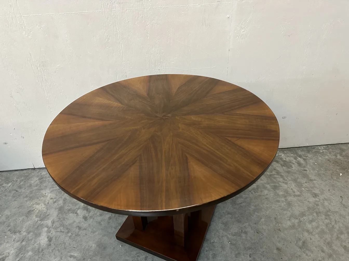 antique small round table decorated with elegant patterns