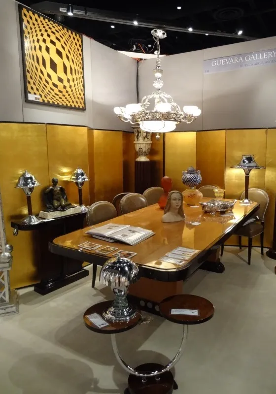 antique small table with decor, golden background, elegant objects