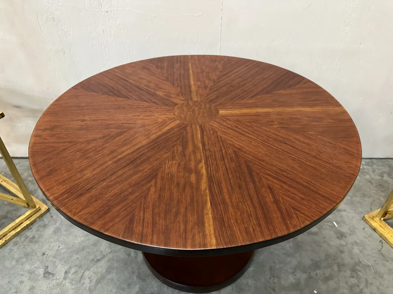 round small table with patterned surface, in a simple setting