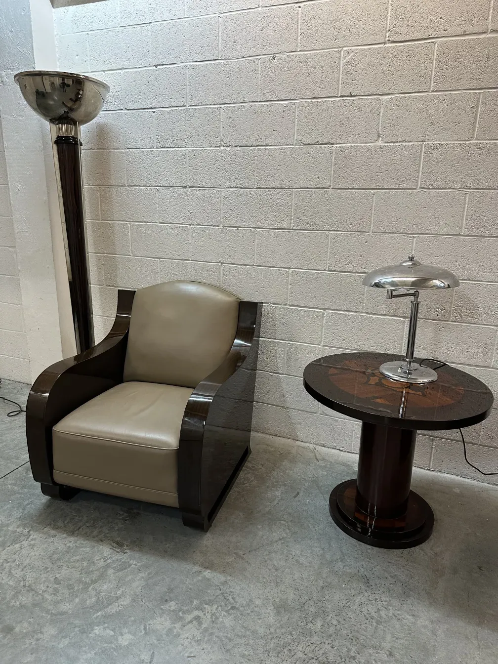 Simple antique small table with round base and decorations