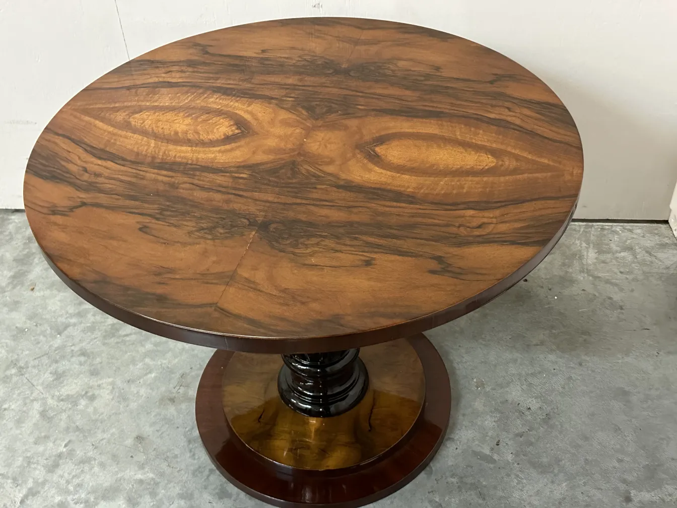 Two antique round small tables with striking details