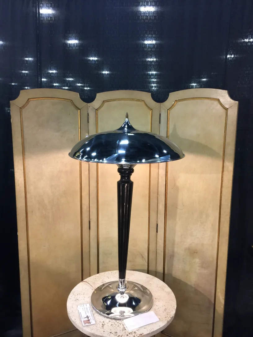 2 antique small tables with a sleek design, set in an elegant environment