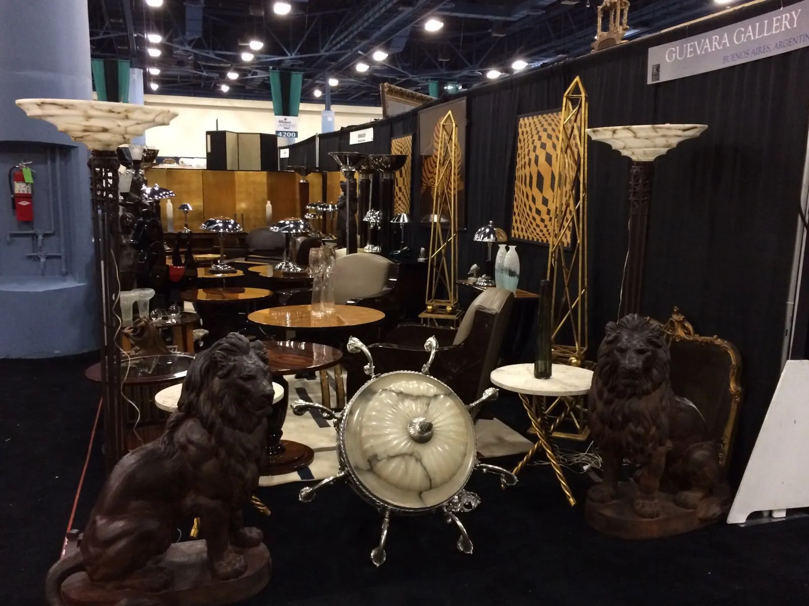 Two antique small tables with decorative details in an elegant setting