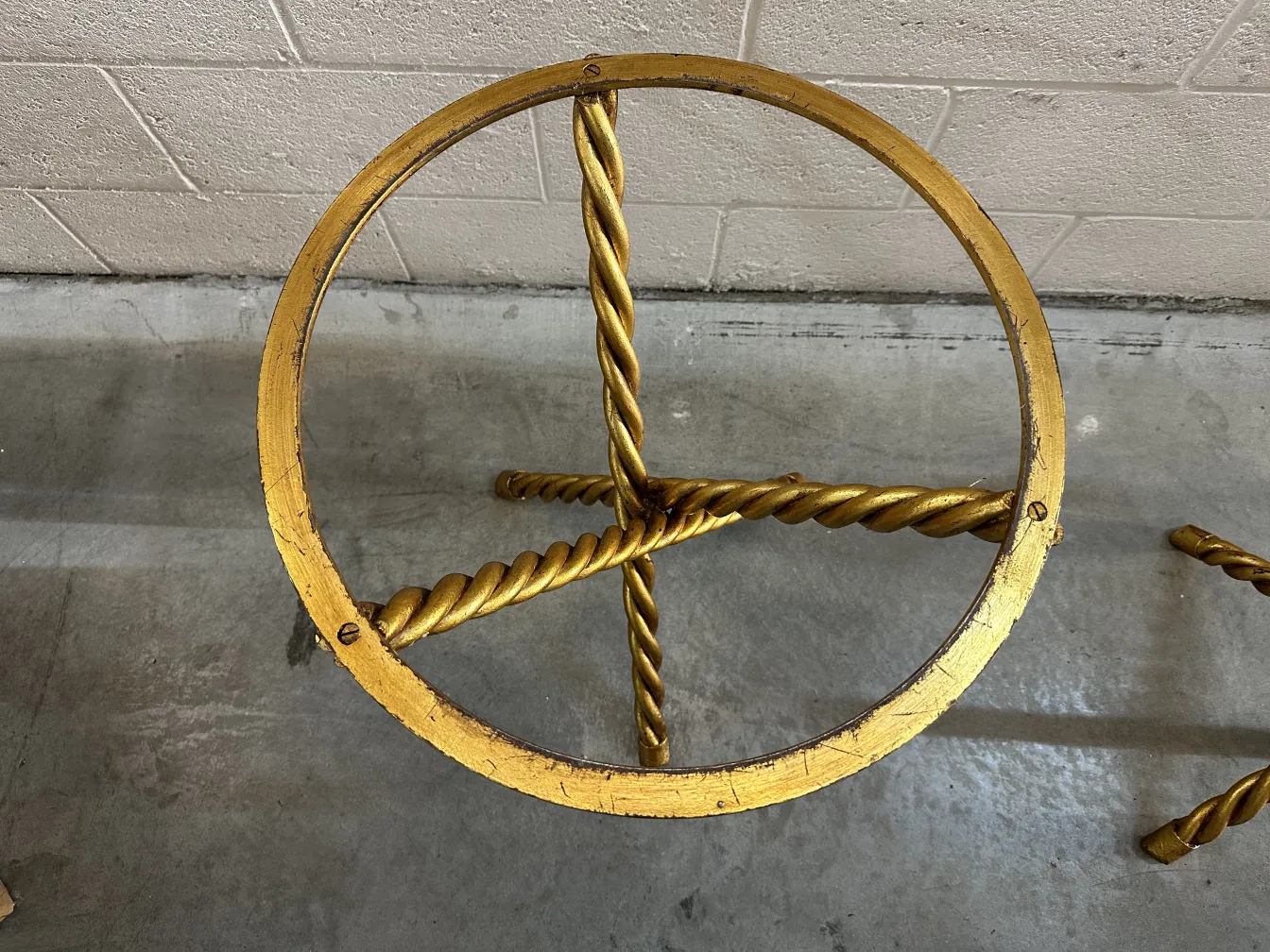 Top view of 2 small antique golden tables with fine details