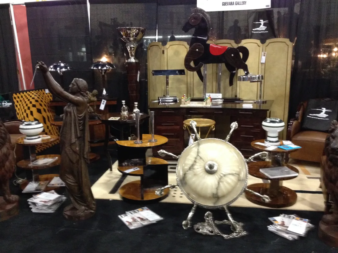 Two antique candle holders, maison desny, in an elegant setting.