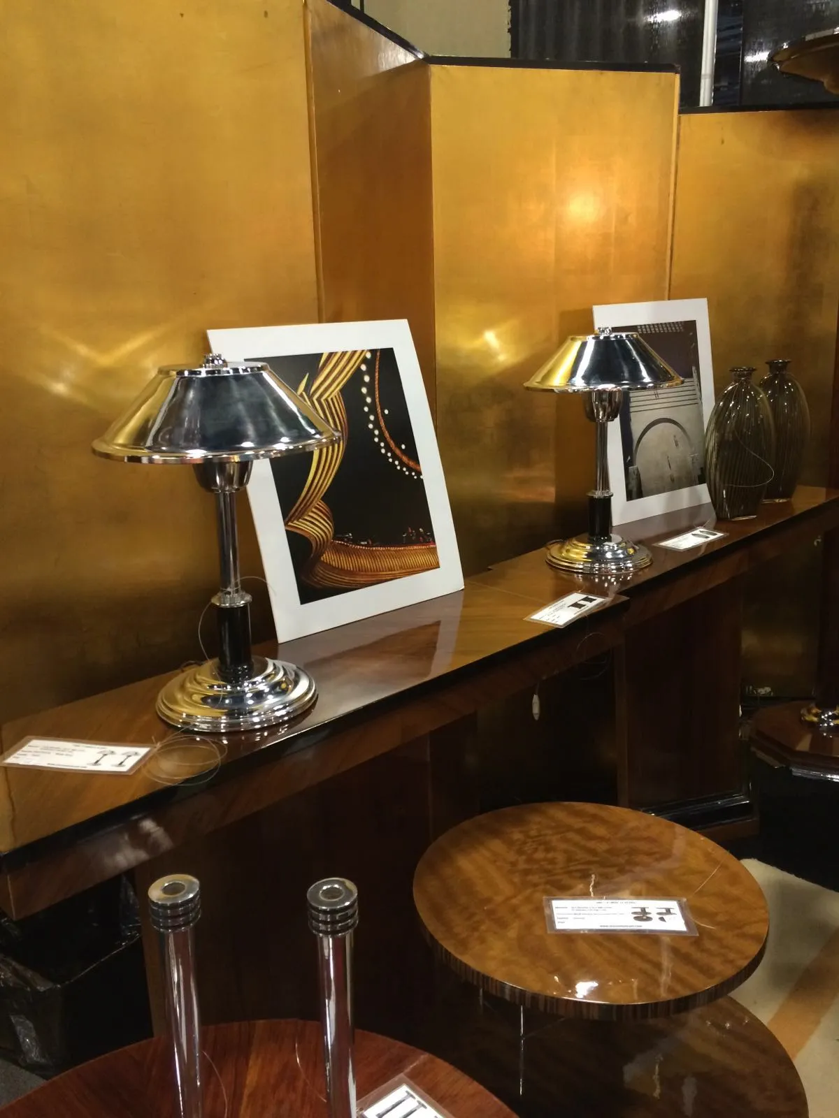 Two antique candelabras with a sophisticated design.