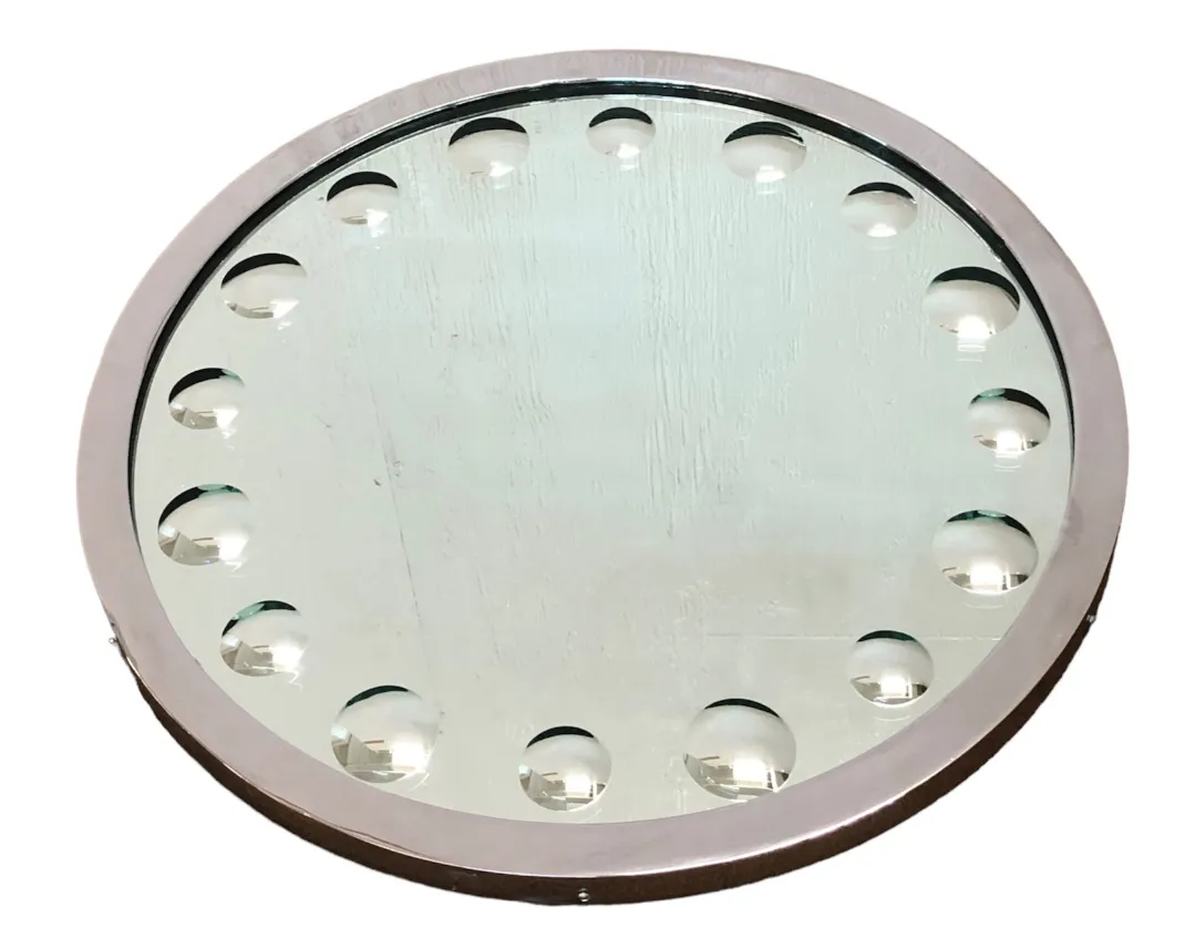 antique round mirror with decorative details