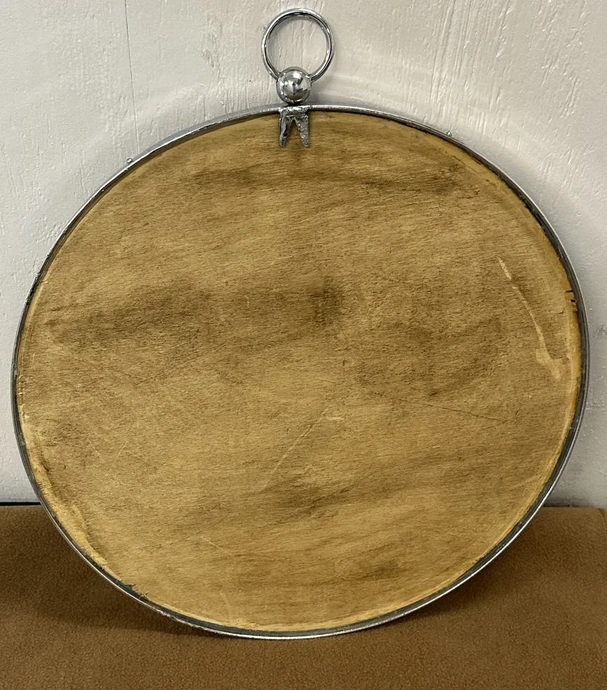 two antique round mirrors with distinctive finish