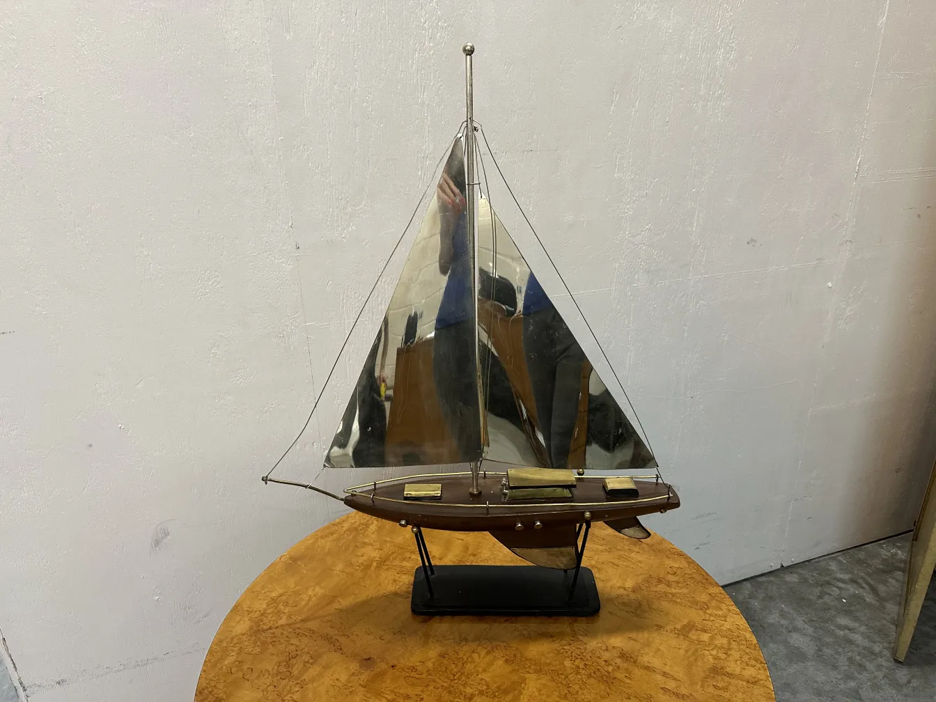 Antique model ship with sails and details on the base