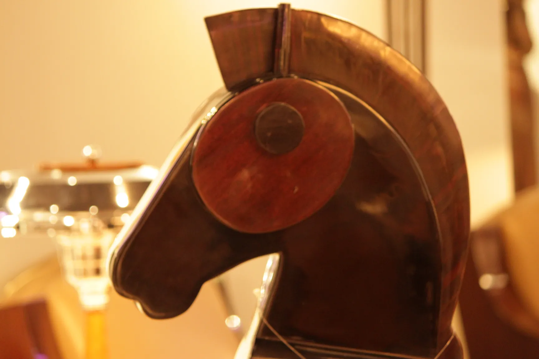 Decorative antique horse head in a warm environment