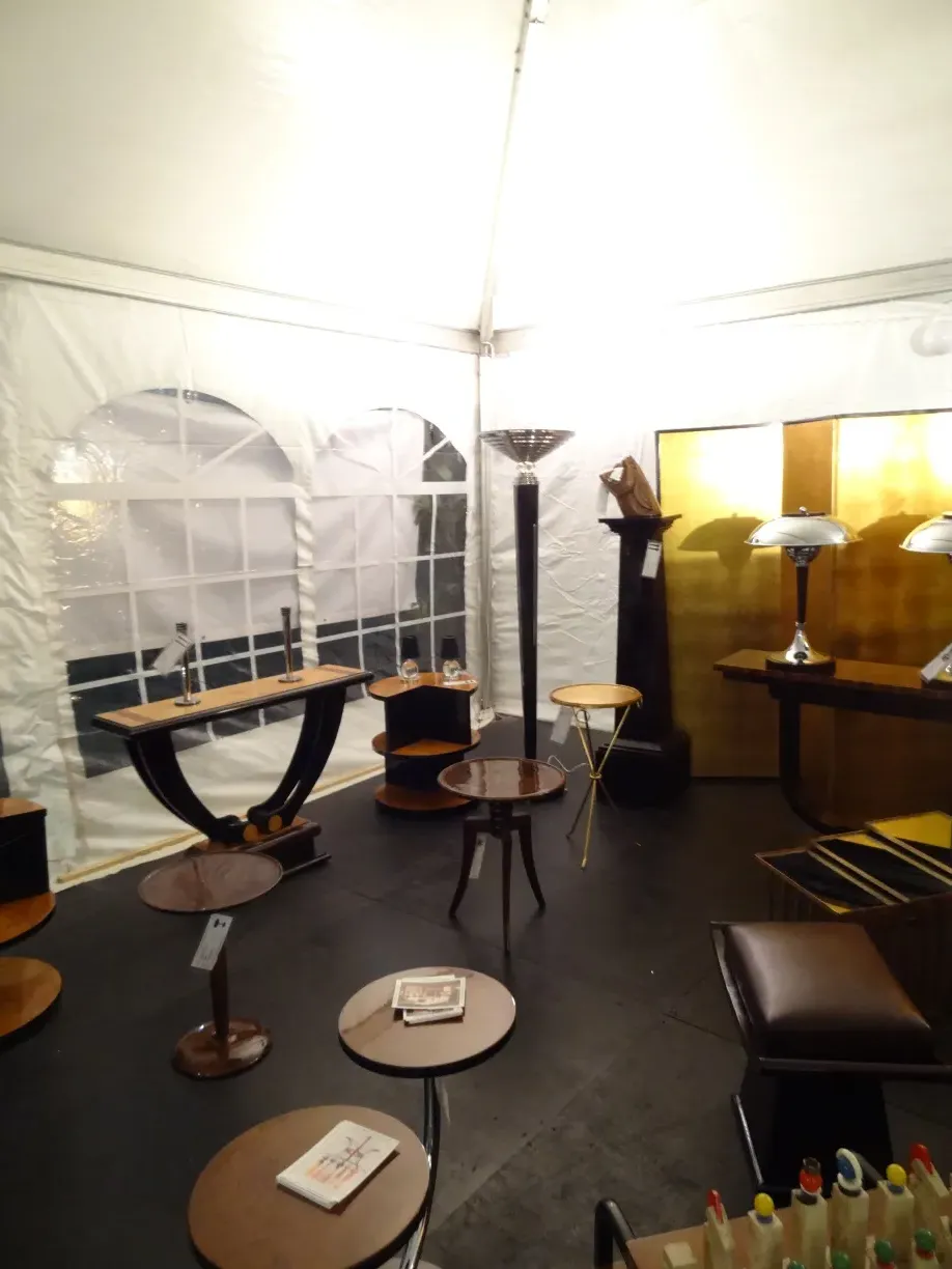 Antique decorative column in a market setting