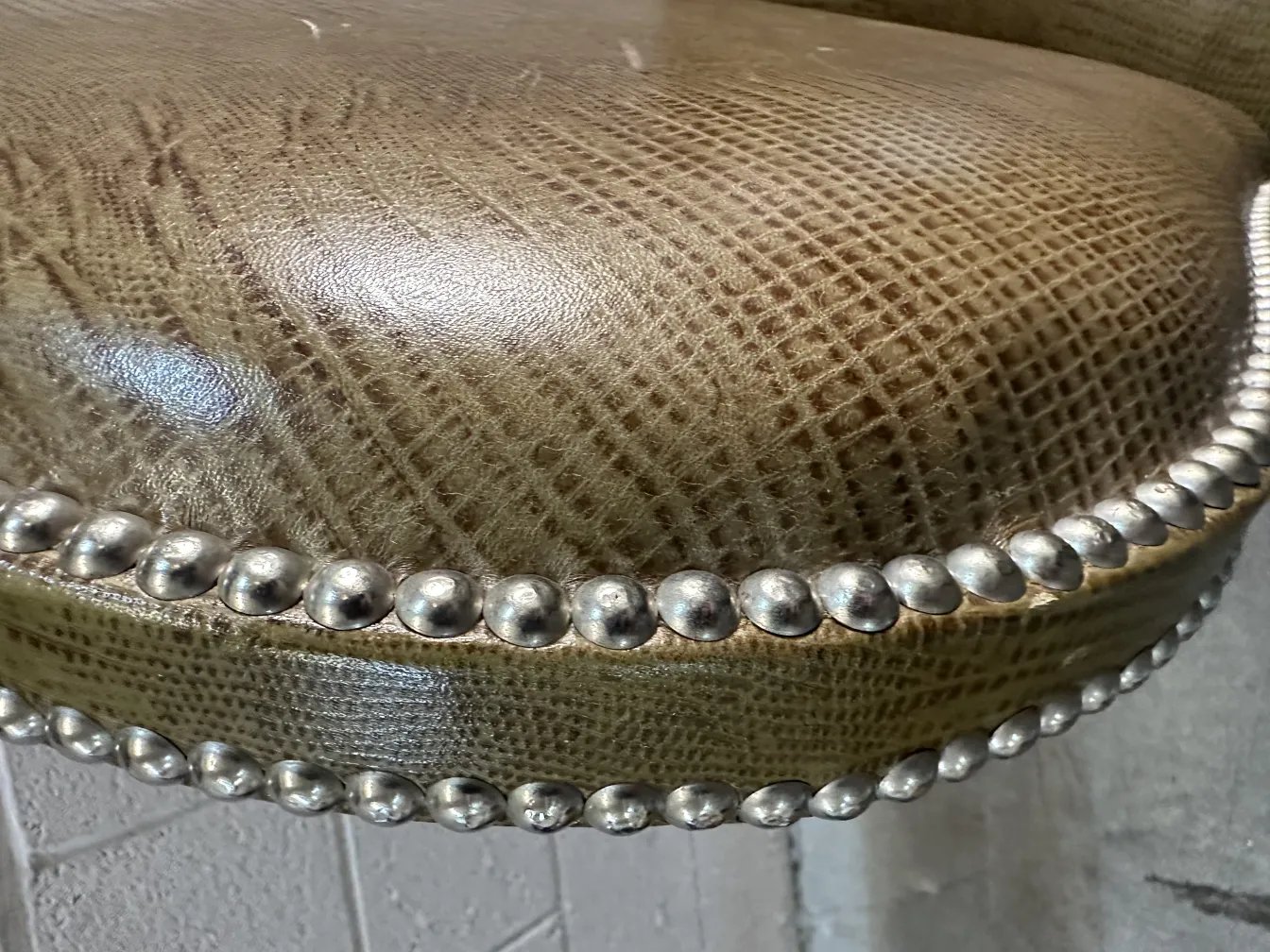 Detailed view of 12 antique chairs with decorative finish