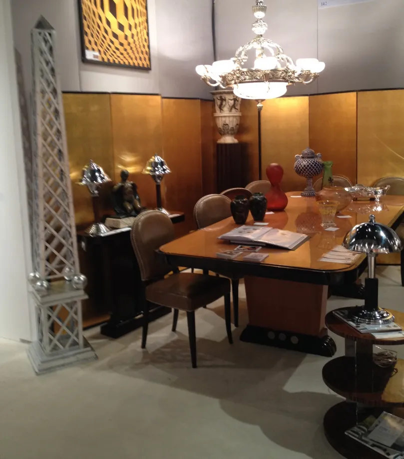 ancient decorative obelisk next to dining table