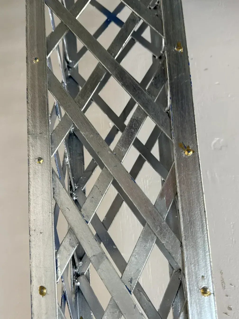 Antique obelisk structure with decorative elements