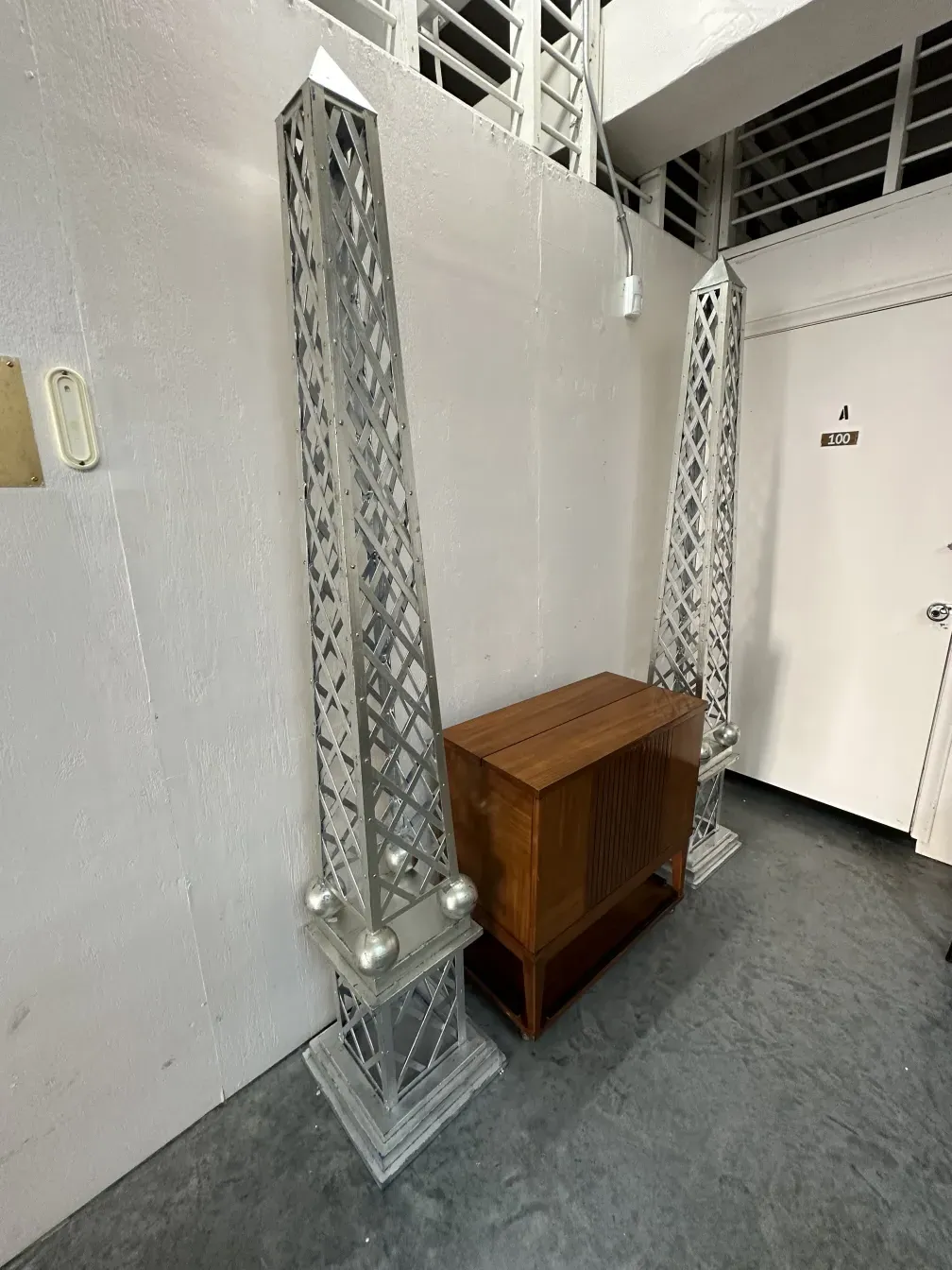 Antique obelisk with decorative shapes at its base