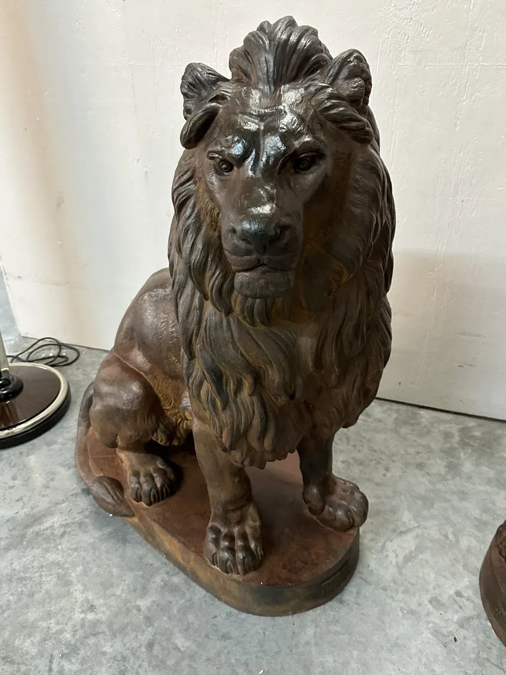 antique sculpture of 2 lions, realistic expression, detailed mane