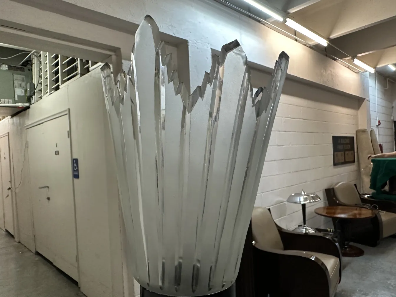 Antique sculpture with pointed shapes, in an antique environment.