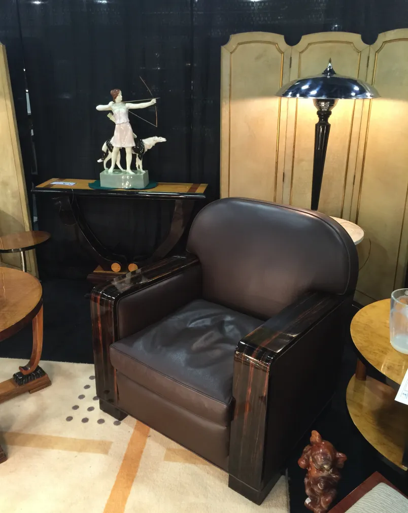 Two antique folding screens by Adolphe Chanaux in a stylish setting.