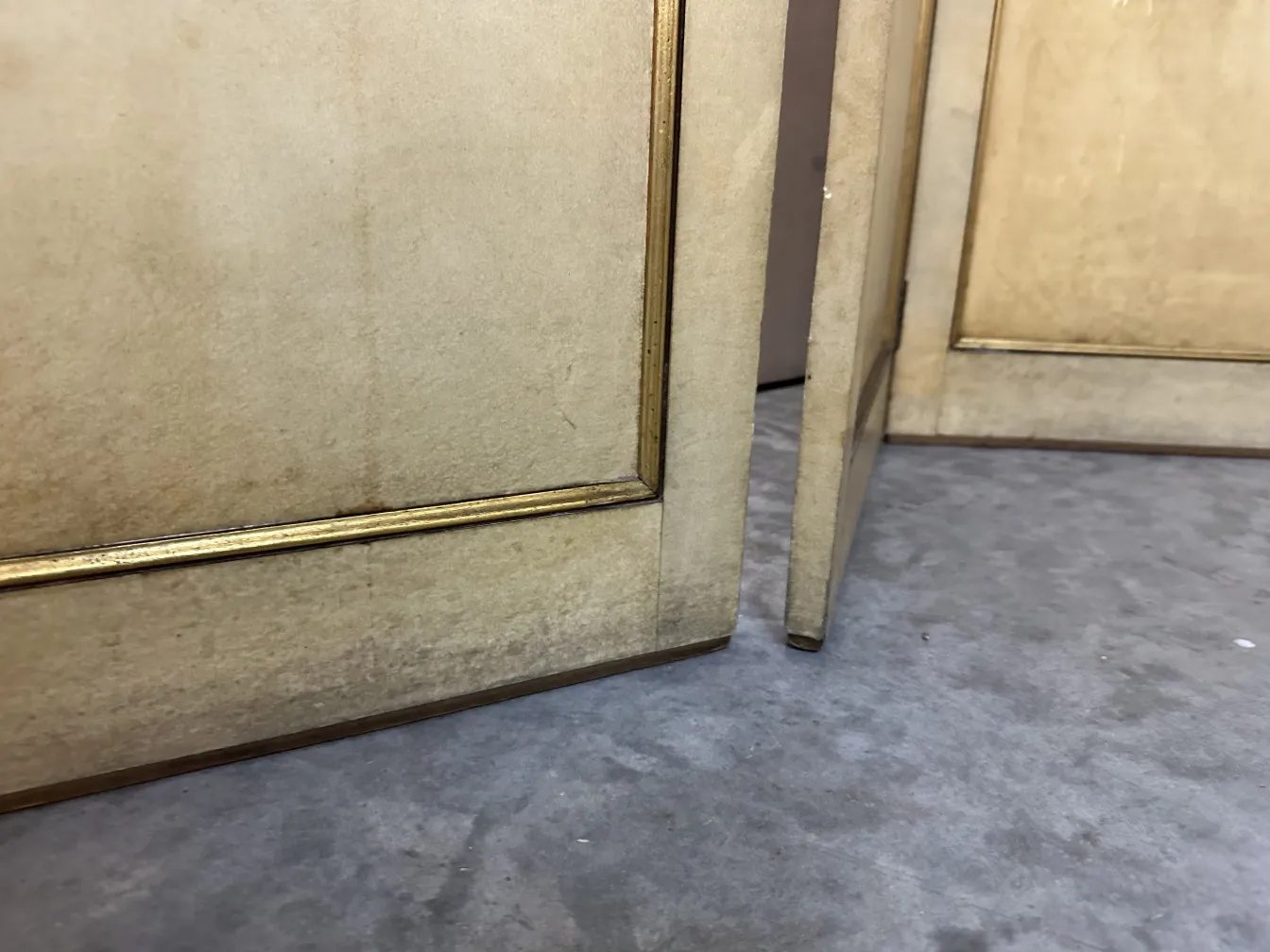 two antique folding screens by adolphe chanaux in a neutral setting