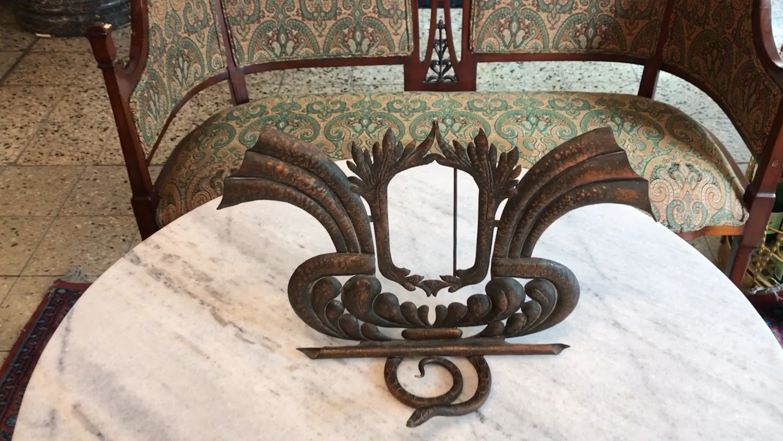 Antique picture frame with decorative design, elegant setting