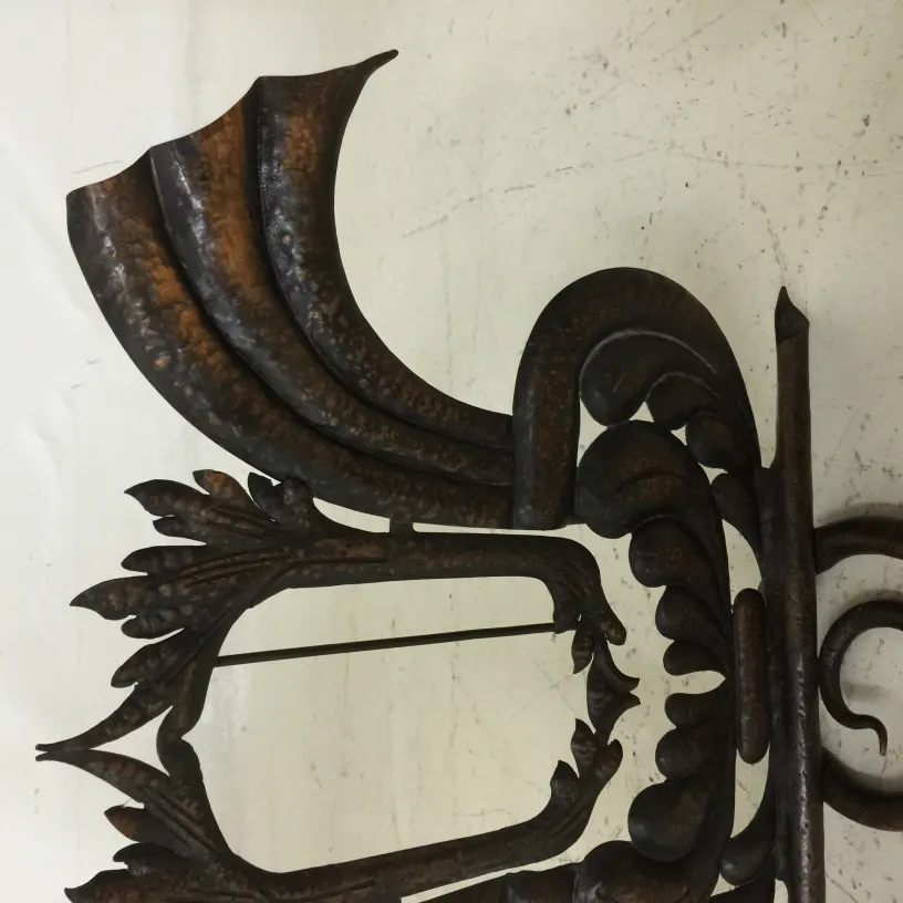 Antique picture frame with decorative design, featuring elegant shapes and ornamental details, ideal for displaying photos