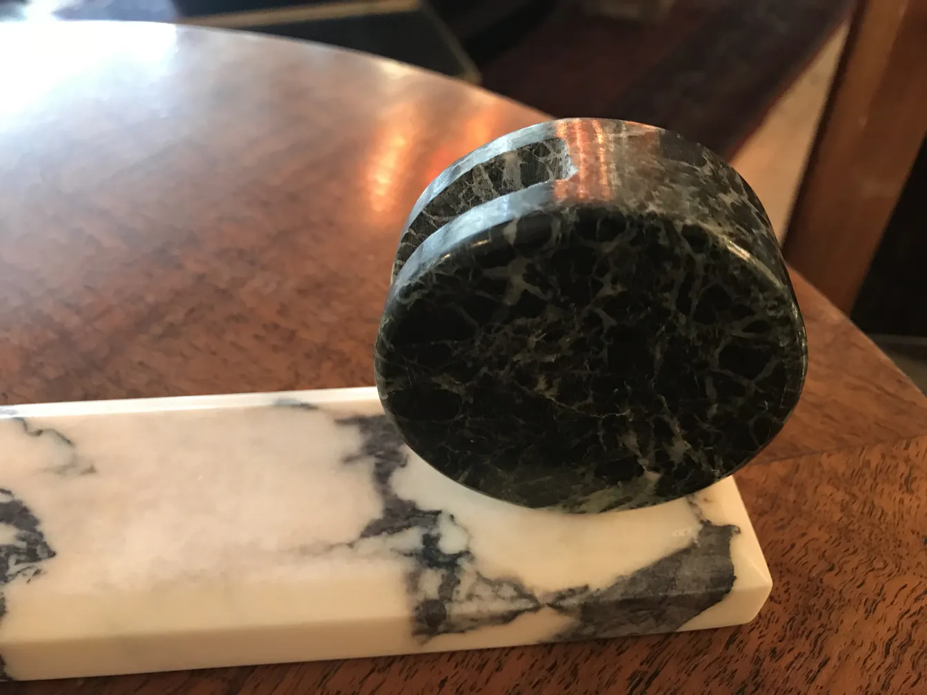 antique picture frame with a dark base in a cozy setting