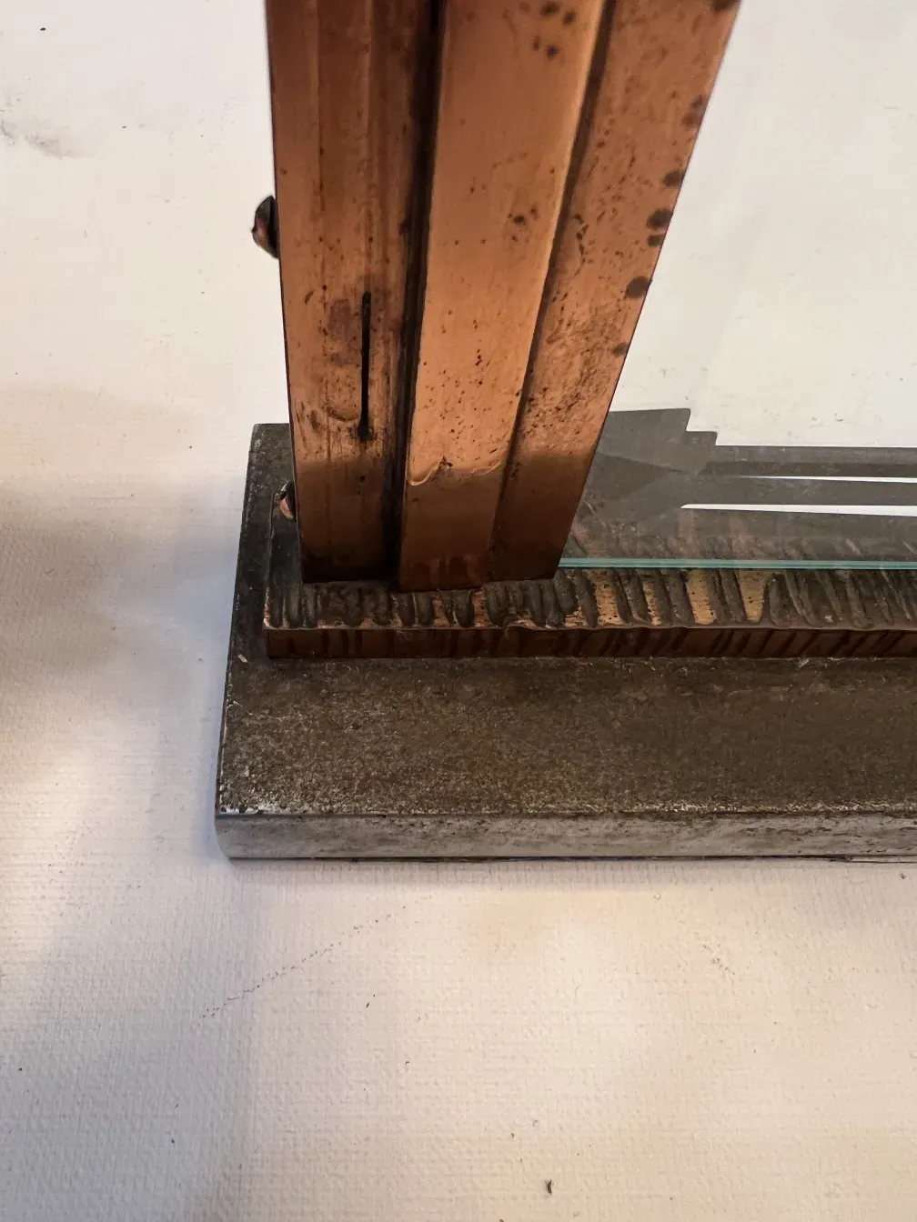 Antique picture frame with decorative copper design