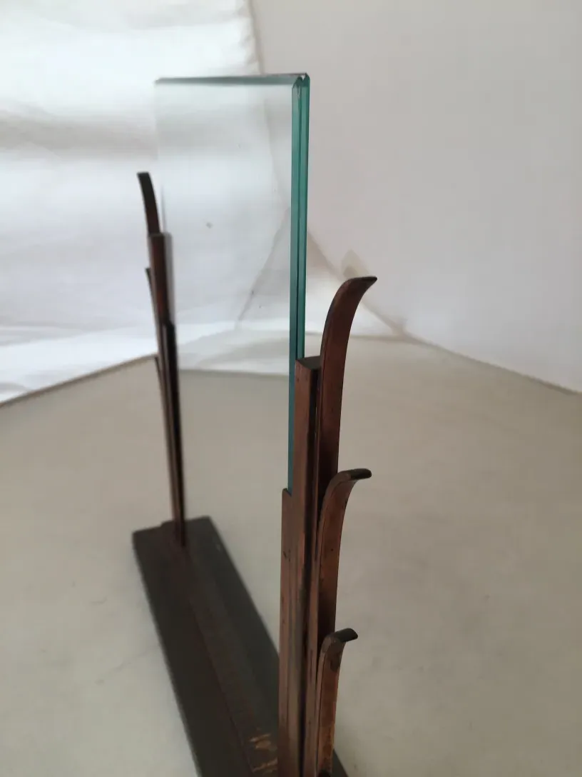 antique picture frame with a light background and decorative elements