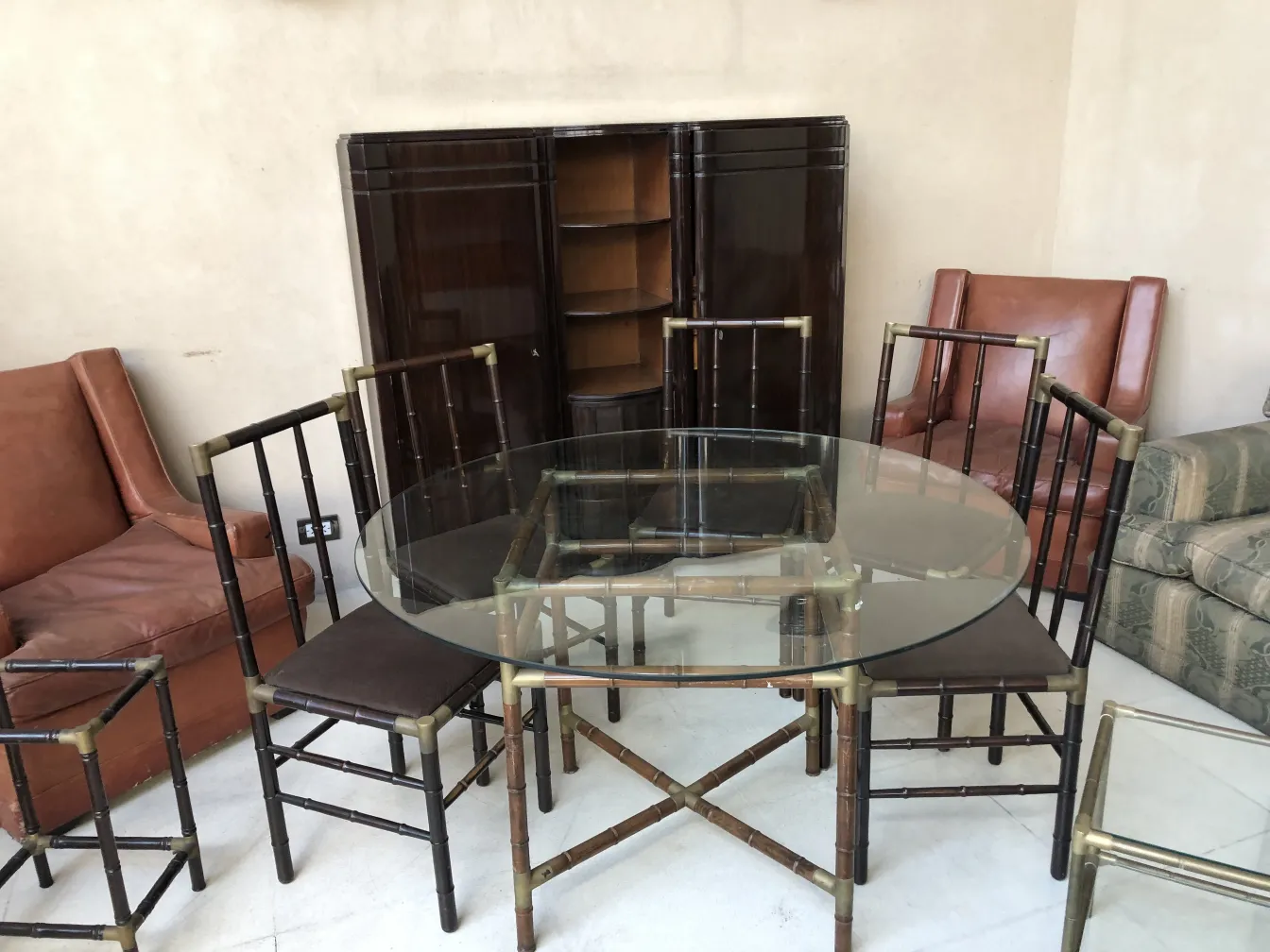 Antique dining table by William Billy Haines with 6 chairs. Elegant and inviting design.