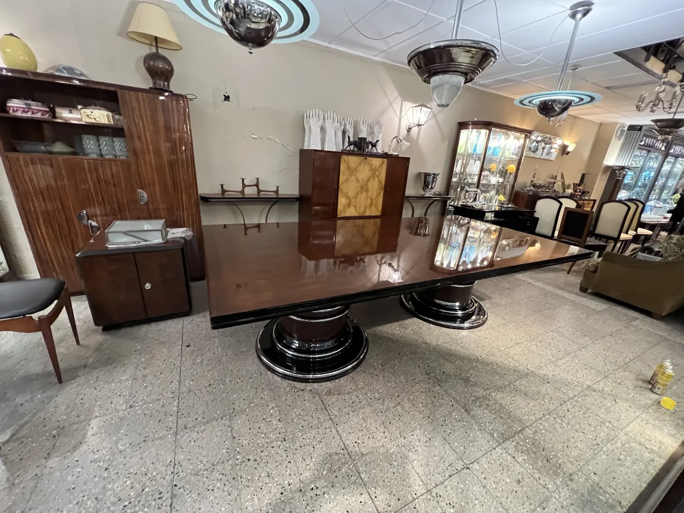 antique dining table for 14 people in an elegant setting