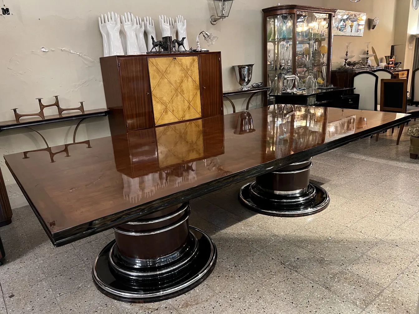 antique dining table for 14 people in an elegant setting