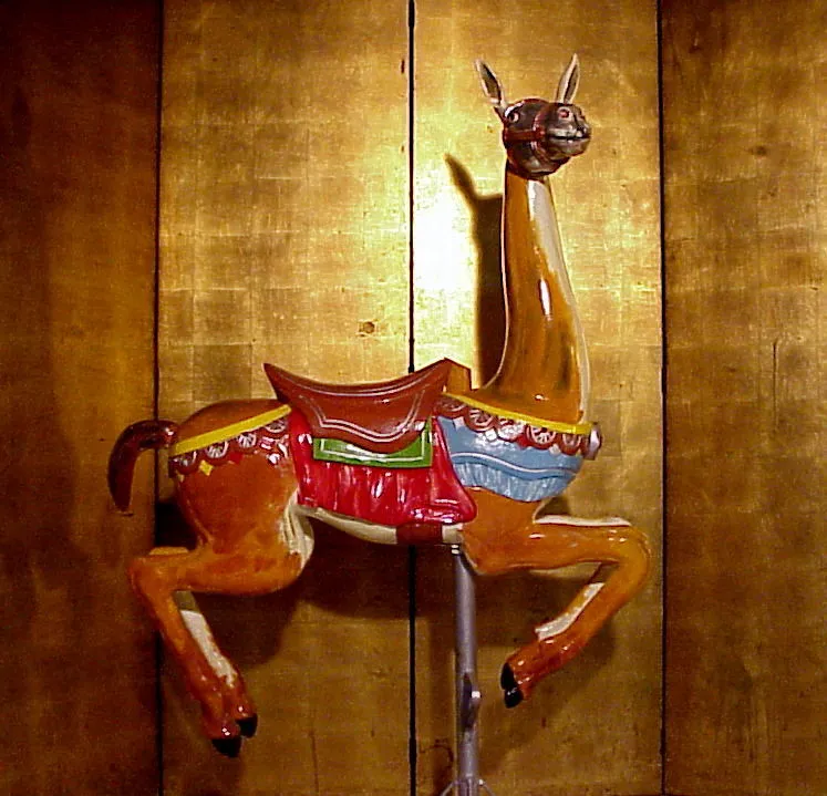 Antique llama figure, brown color with decorations
