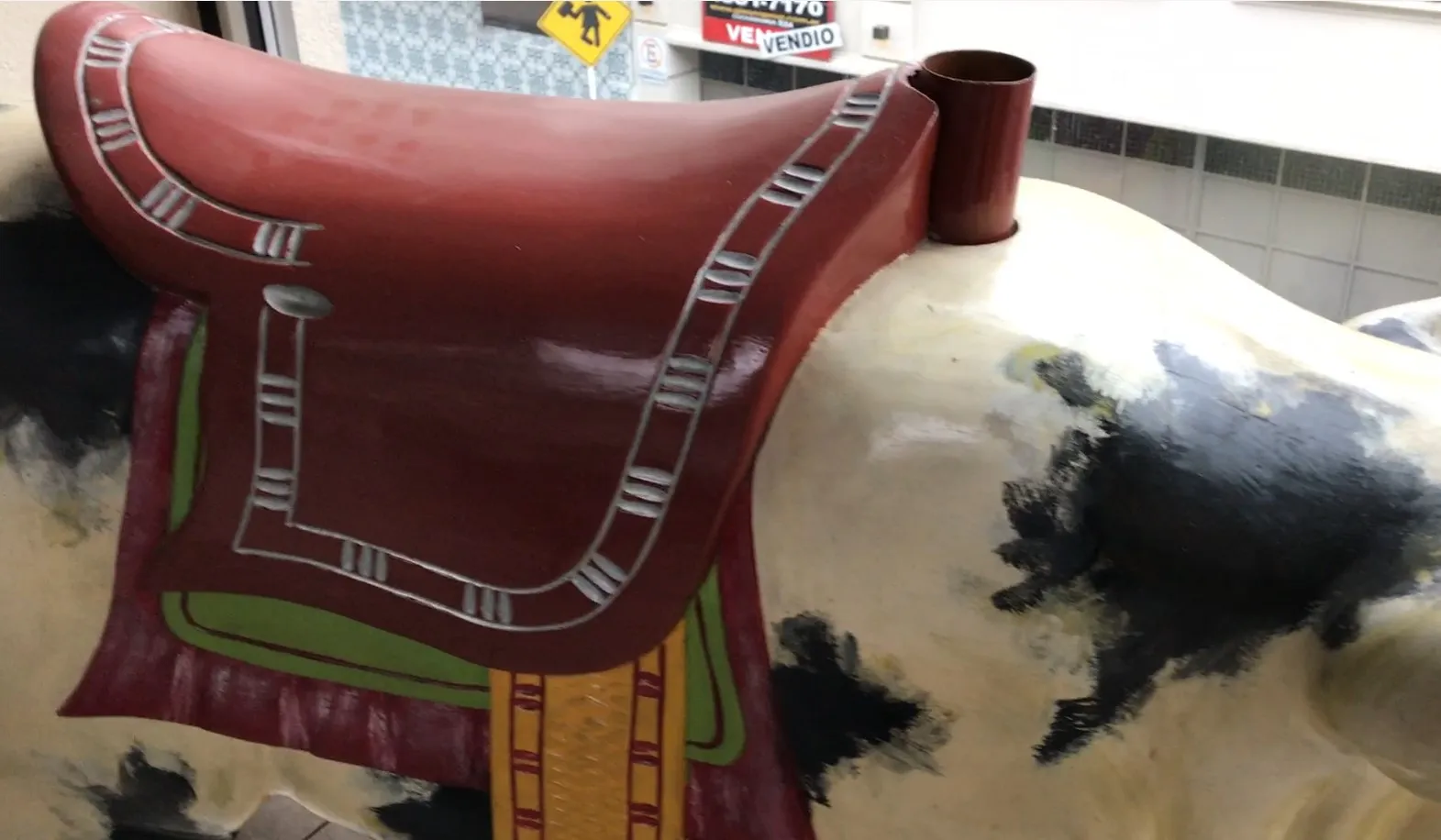 Antique pig decoration with colorful details