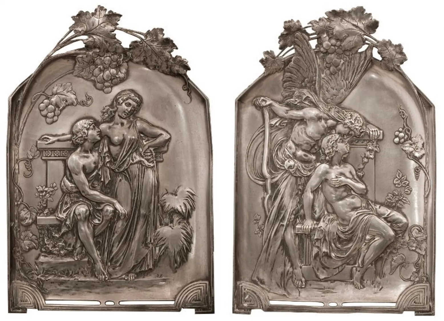 two antique wall plaques with relief figures wmf