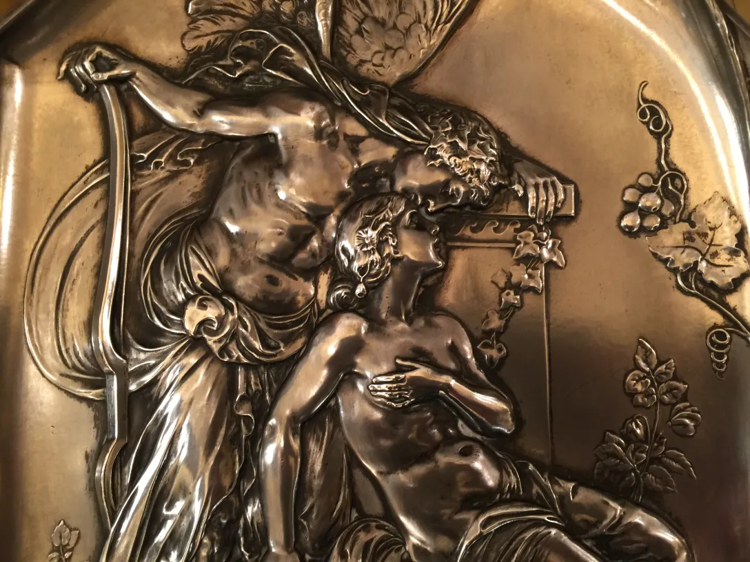 Antique wall plaques with embossed details, WMF