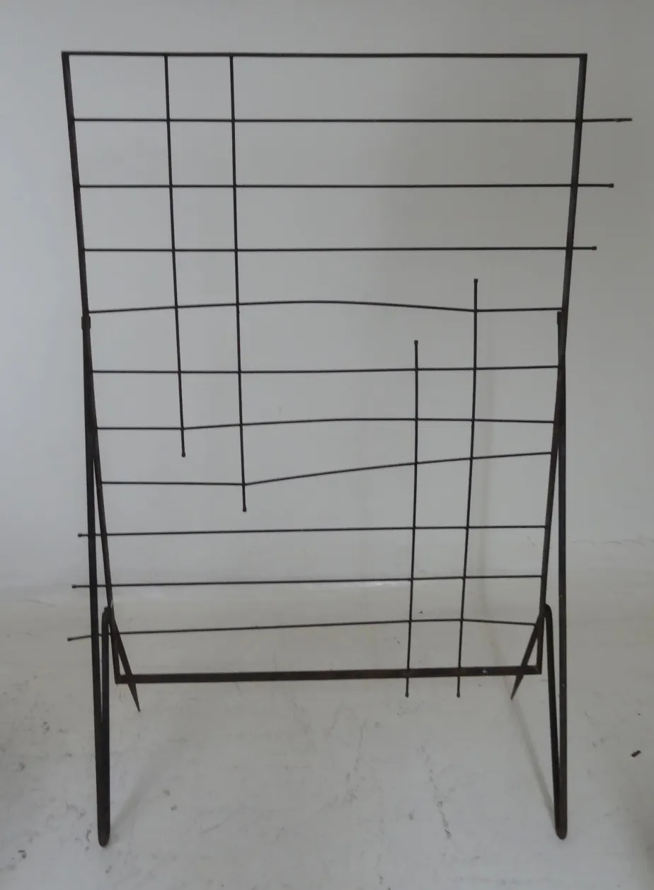 Antique folding screen with decorative structure, elegant and styled.