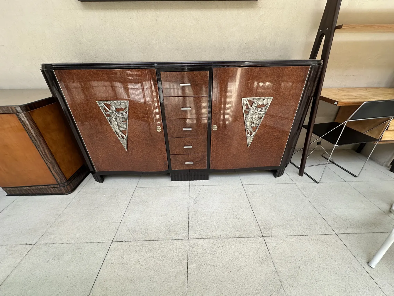 antique art deco sideboard with decorative features