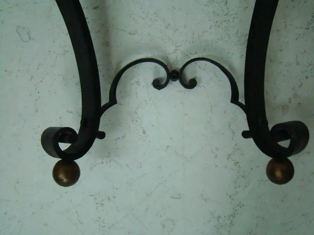 curved details on an antique console edgard brant