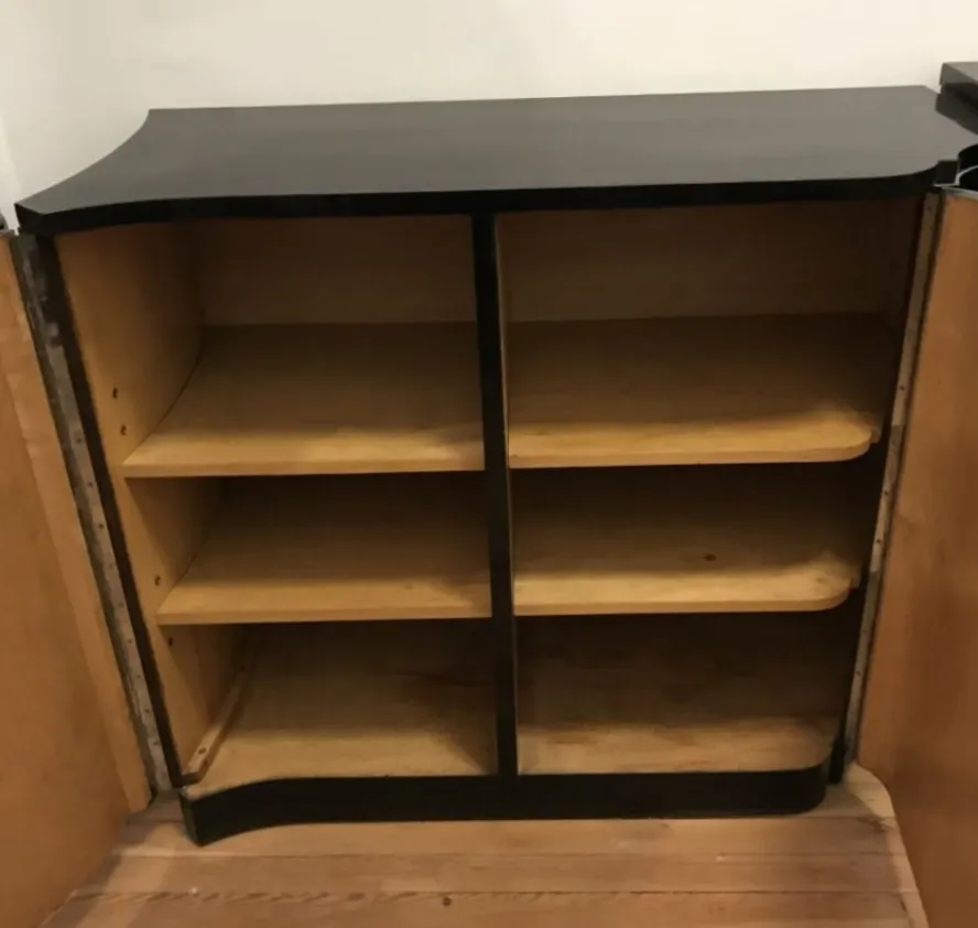 vintage cupboards with visible shelves, set in a classic environment