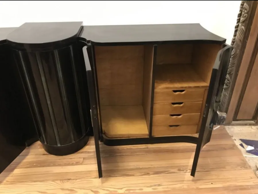 antique cupboard featuring art deco design and internal storage