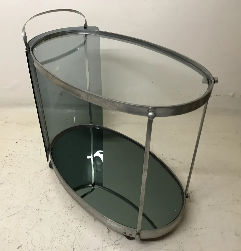 antique cart table with neutral background and glass