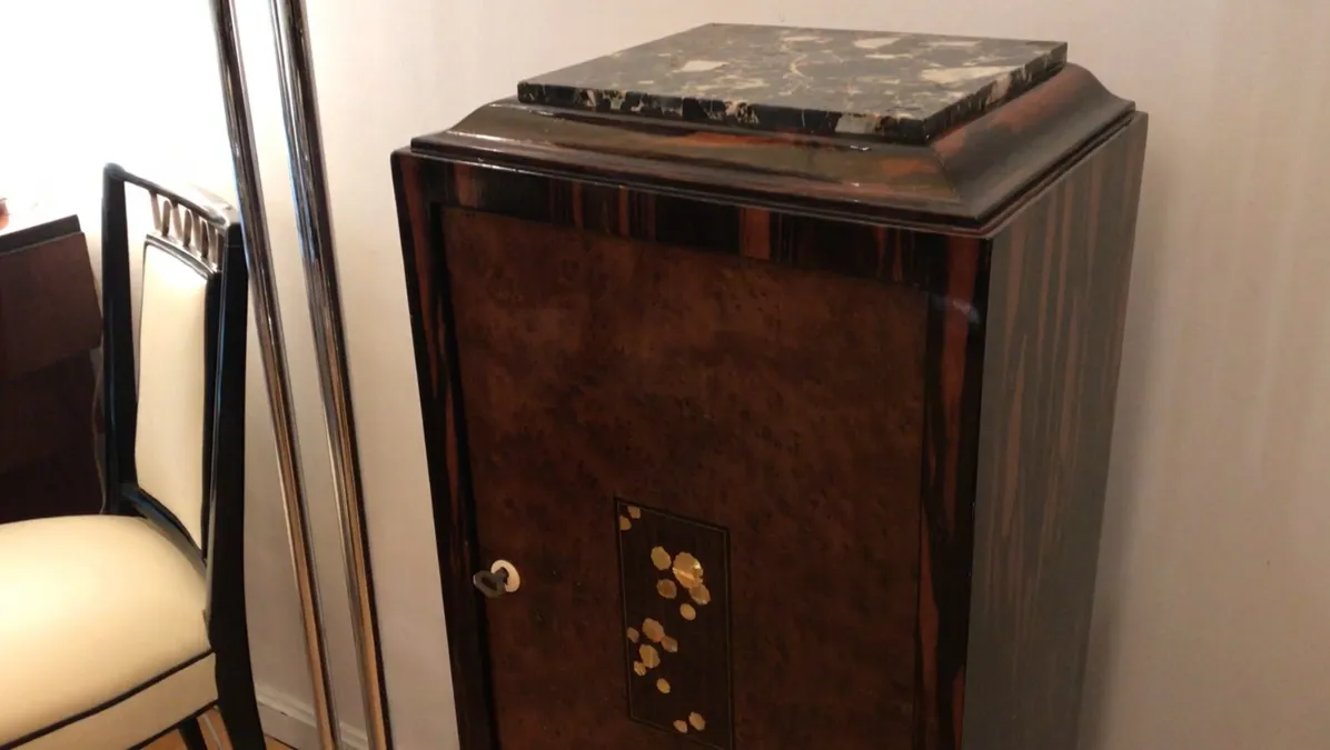 antique decorative column with unique details in the environment