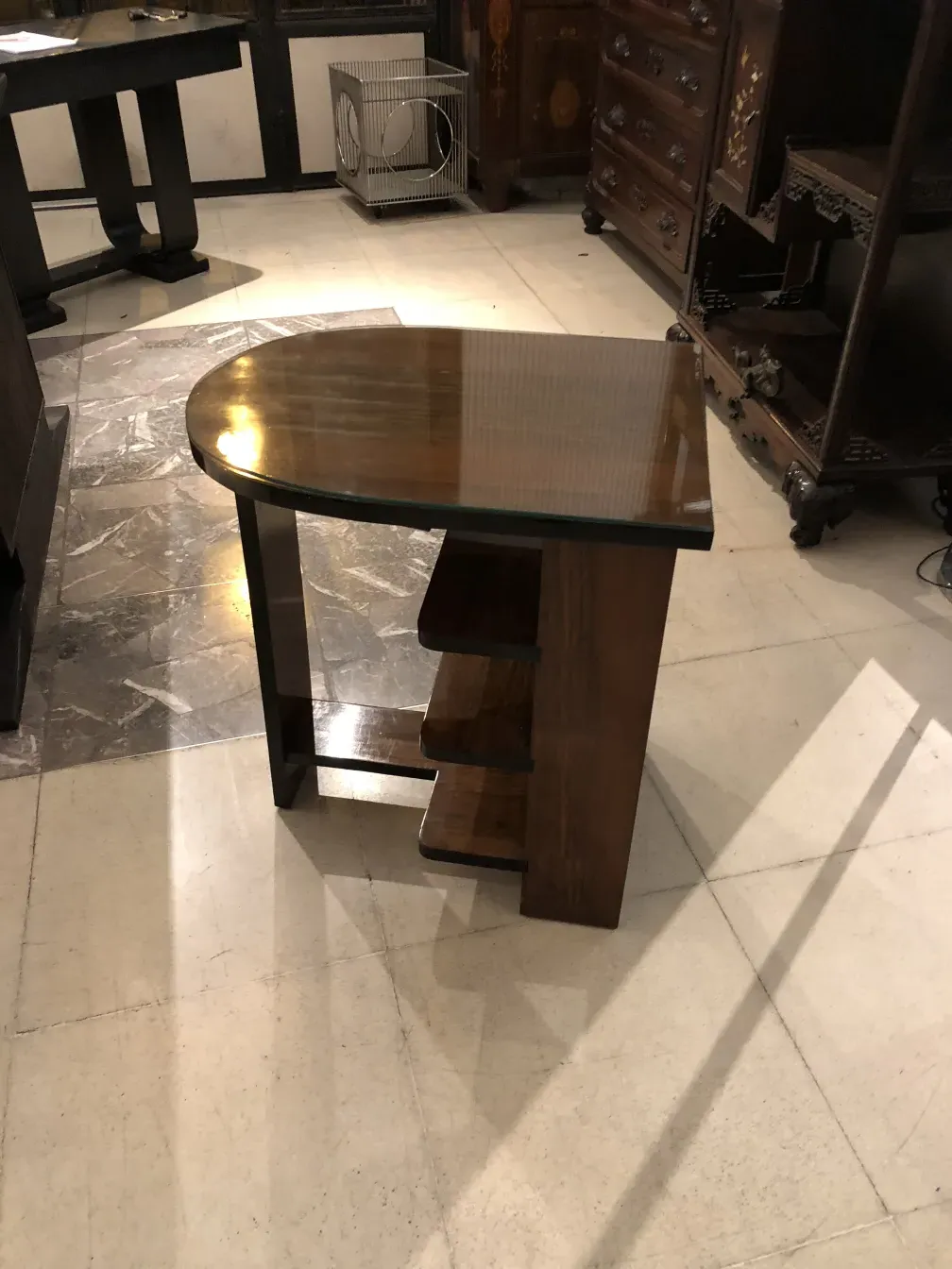 Antique table in Art Deco style, elegant design, classic atmosphere.