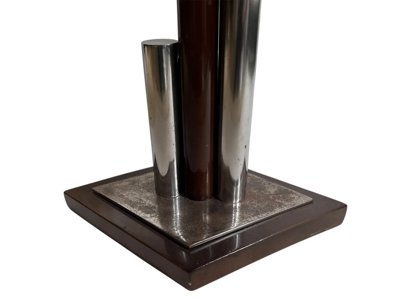 Antique Art Deco table with a modern base and elegant design, set in a minimalist environment.