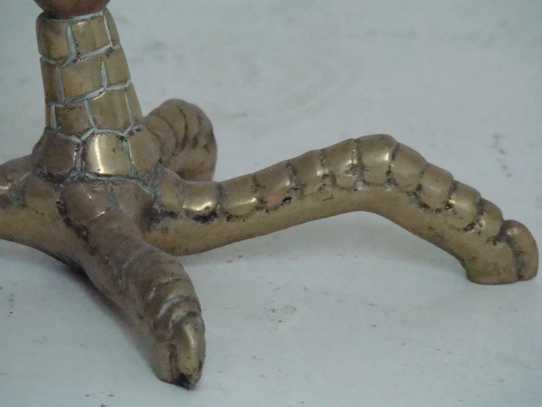 Detailed view of the legs of the unique antique tables with distinctive design