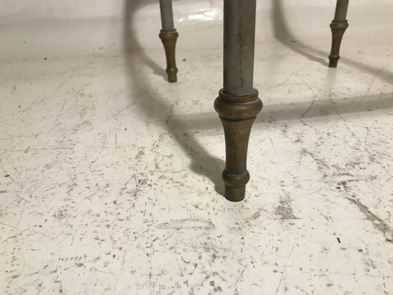 Antique garden table with decorative legs