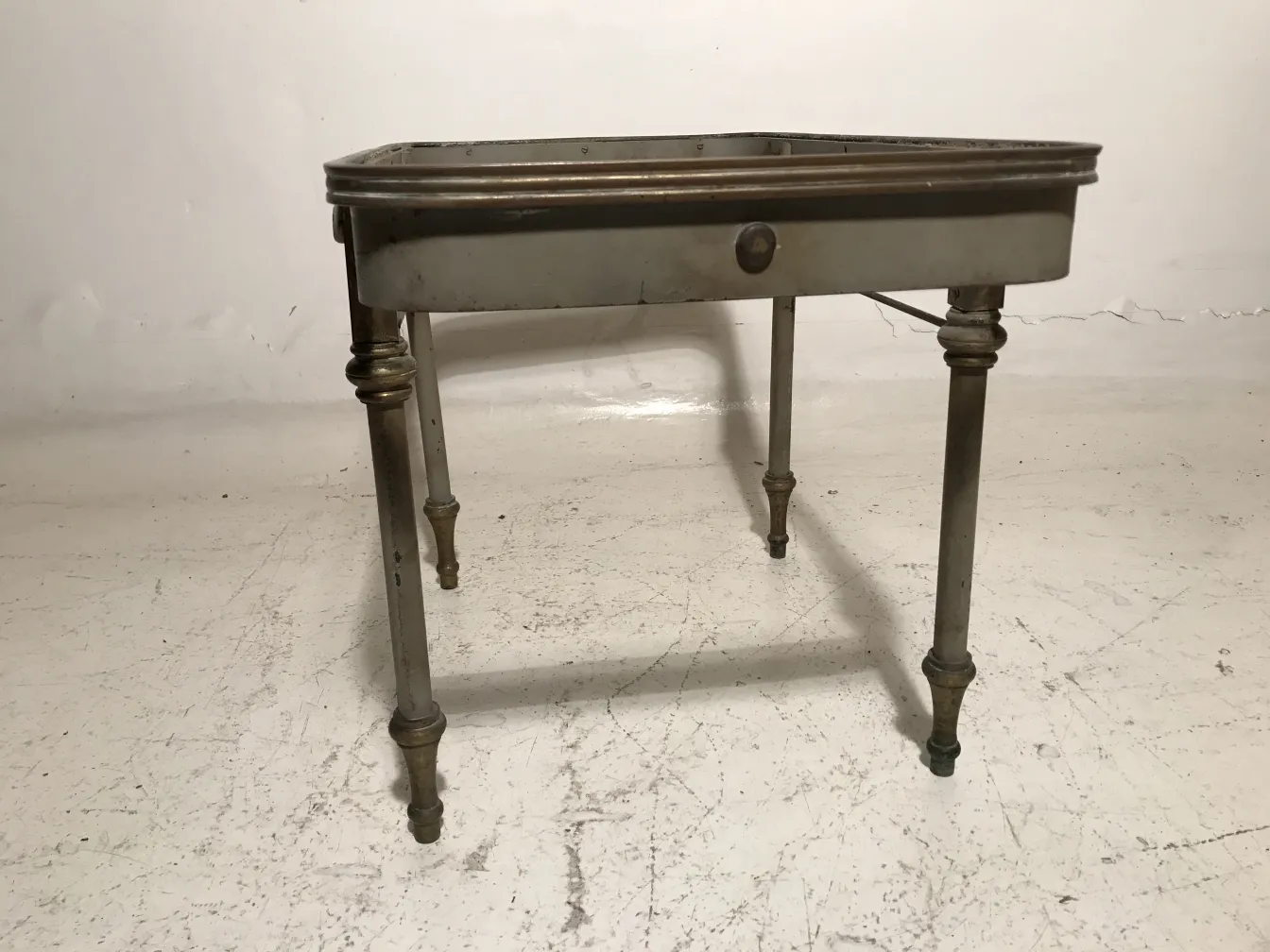 antique garden table with decorative legs