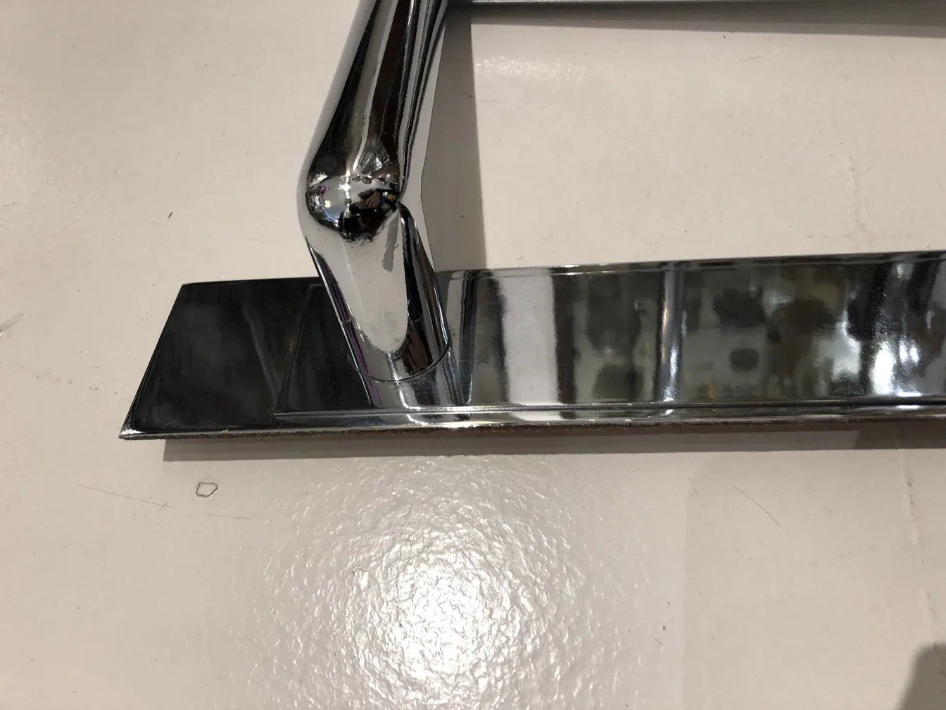 antique door handles with shiny finish in decorative context