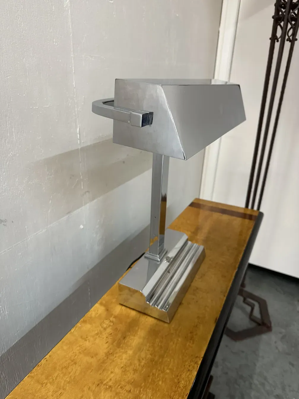 Antique table lamp with sleek Art Deco style, elegant design.